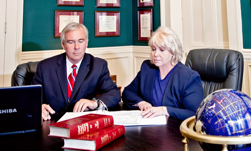 Martin E. Regan Jr. and staff Martin E. Regan Jr. and staff
