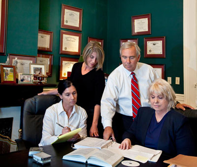 Martin E. Regan Jr and supporting staff Martin E. Regan Jr and supporting staff